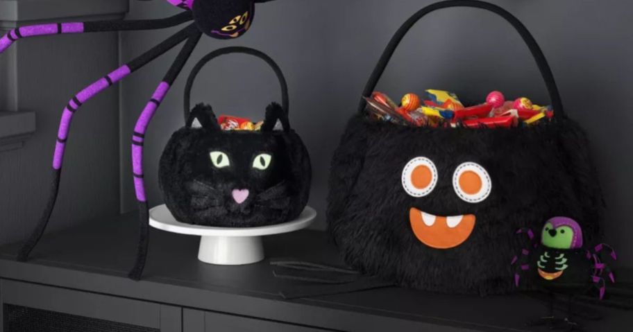 Hyde and EEK! Boutique Halloween cat and spider Trick or Treat Pails on display