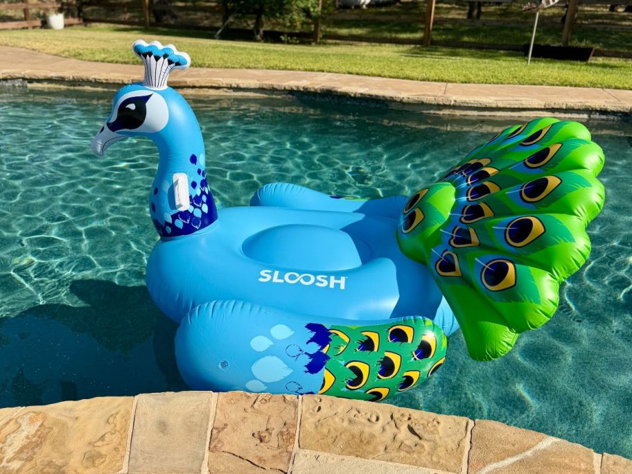 blue JOYIN Inflatable Peacock Pool Float in pool