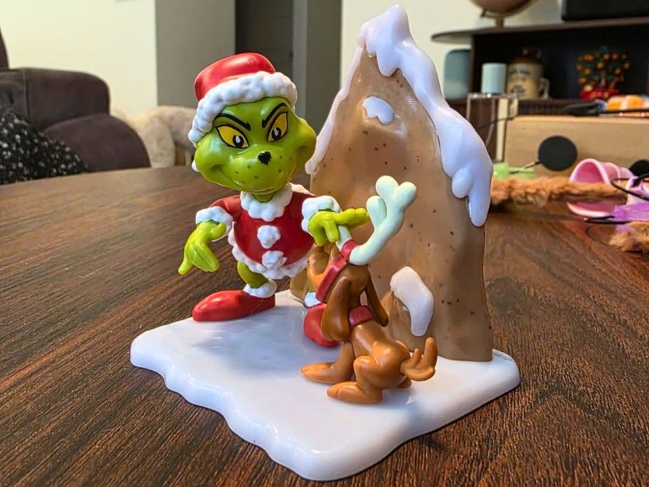 Just Play The Grinch Scene Setters on top of the table