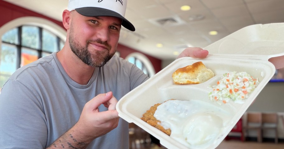 KFC Country Fried Steak Meal being held by man