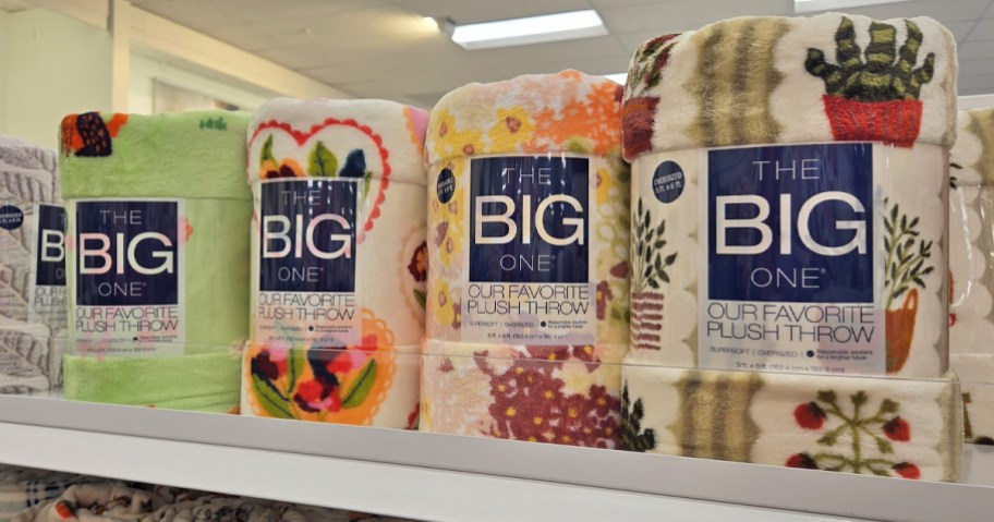 printed throw blankets on store shelf