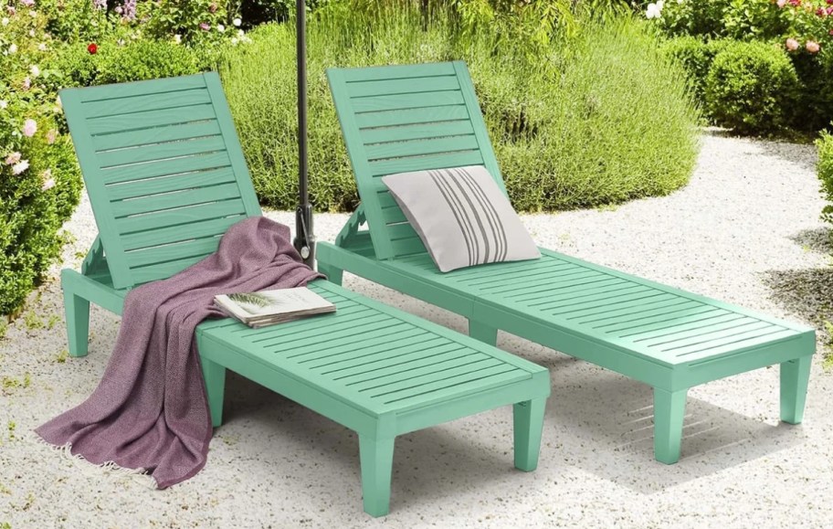 two green chaise lounges