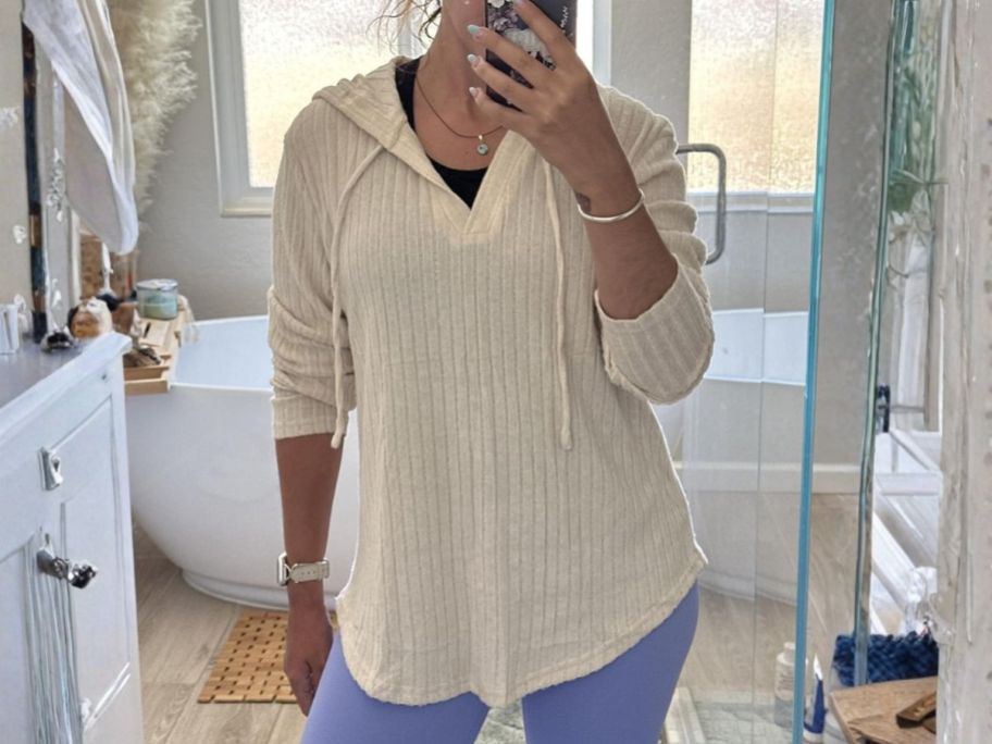 woman wearing Lylinan Women's Long Sleeve Knit Hoodie Sweater