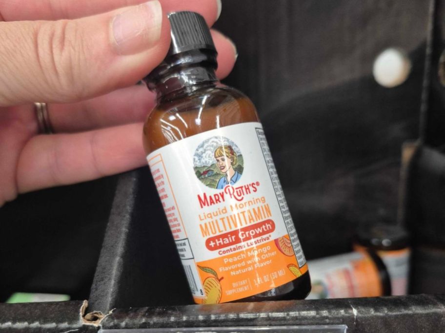 MaryRuth Organics Liquid Morning Multivitamin + Hair Growth in hand in store
