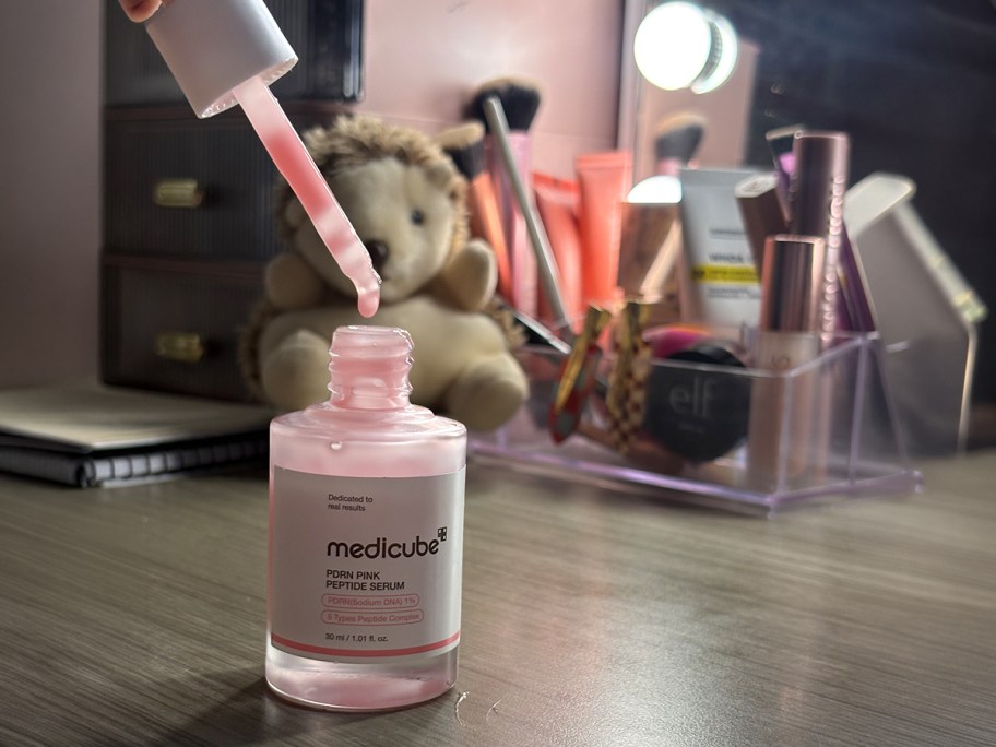 Medicube PDRN Pink Peptide Serum being used