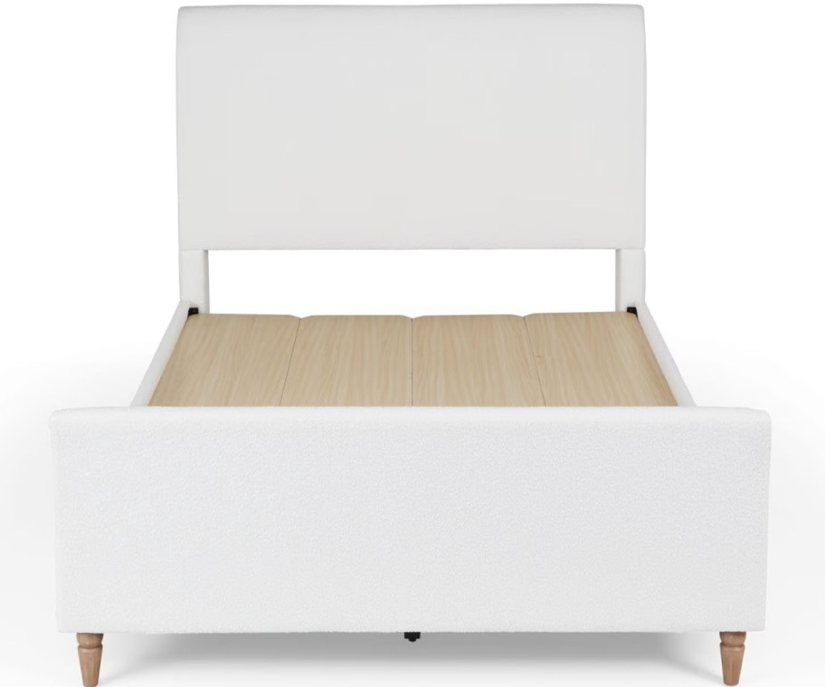 white boucle upholstered bed