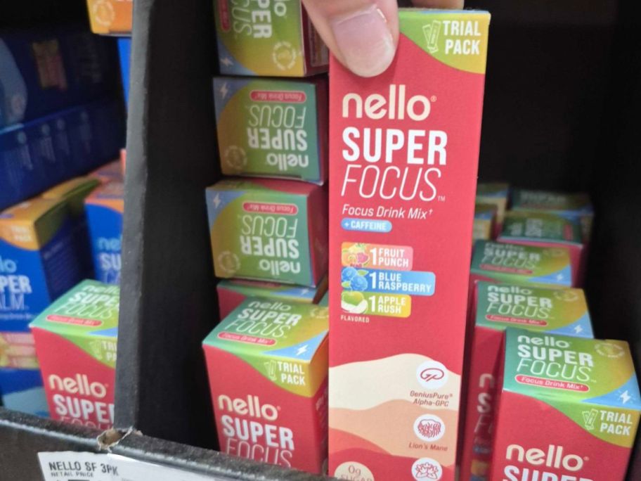 Nello Flavored Drink Mix Packets in Superfocus in hand in store