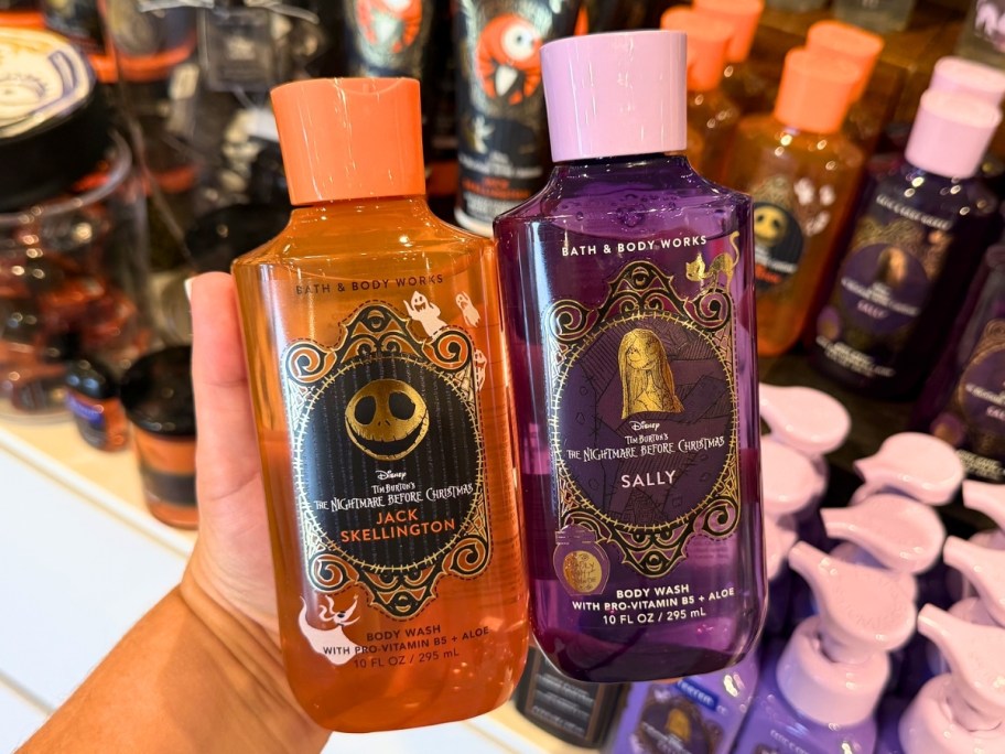 person holding nightmare before christmas bath & body works Jack & Sally body washes in store