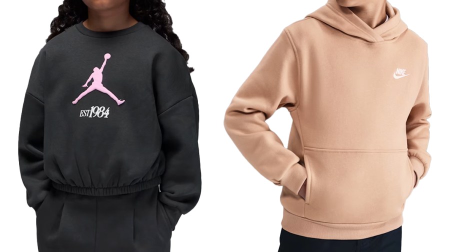 two kids in black and tan nike sweatshirts
