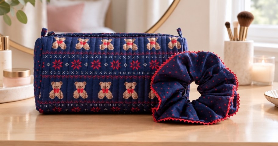 no boundaries quilted pouch and scrunchie with holiday bears print sitting on beauty vanity