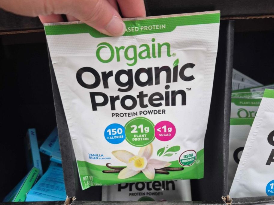 Orgain Organic Vegan 21g Protein Powder Packet in hand in store