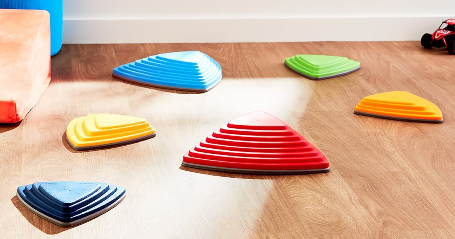 colorful plastic stepping stones on playroom floor