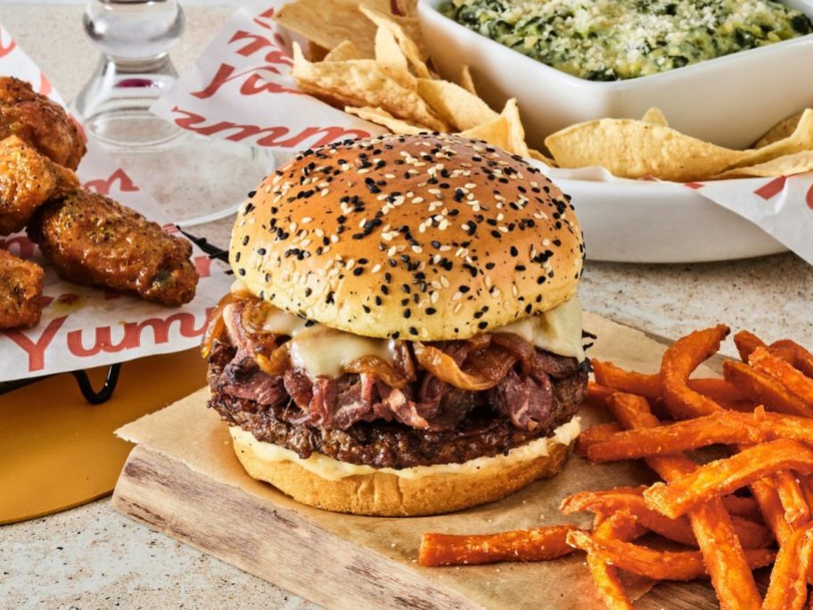 red robin Prime Rib Stack Burger on table with other food