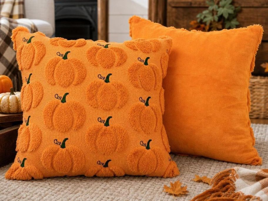 Pumpkin pillow covers on top of the couch