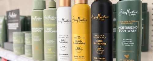 colorful bottles of SheaMoisture Body Wash on store shelf