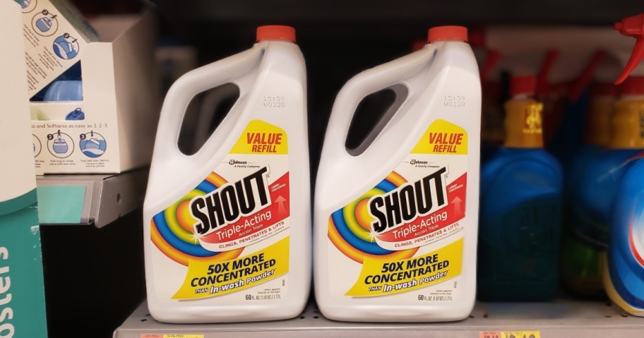 two 60oz bottles of shout stain remover refills on store shelf
