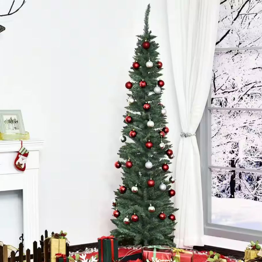 Skinny with decor Christmas tree on the floor