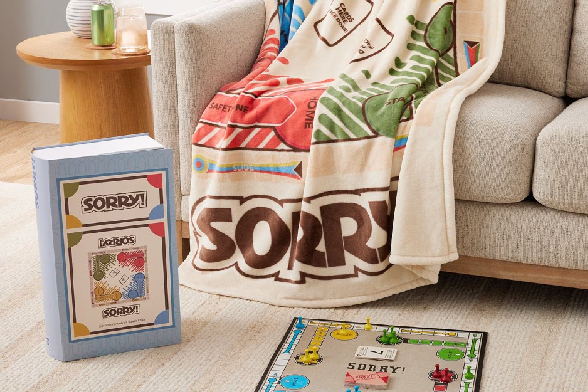 sorry game blanket on chair next to giftable box