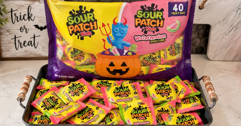 tray full of individual packs of Sour Patch Kids candies