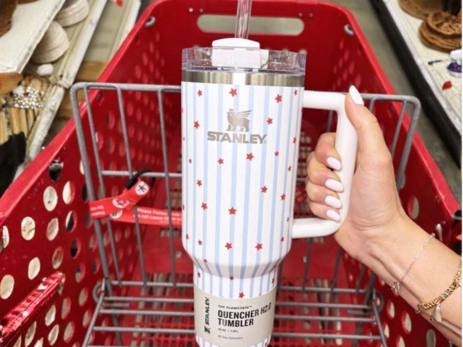 hand holding Stanley 1913 Starry Tumbler in store