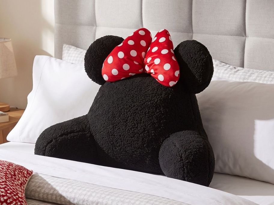 The Big One Disney's Minnie Mouse Shaped Backrest Pillow on bed
