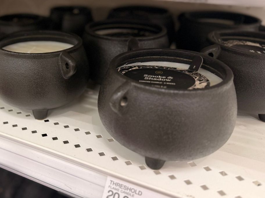 Threshold 3-Wick Large Cauldron Smoke & Shadow Halloween Candle on shelf in store