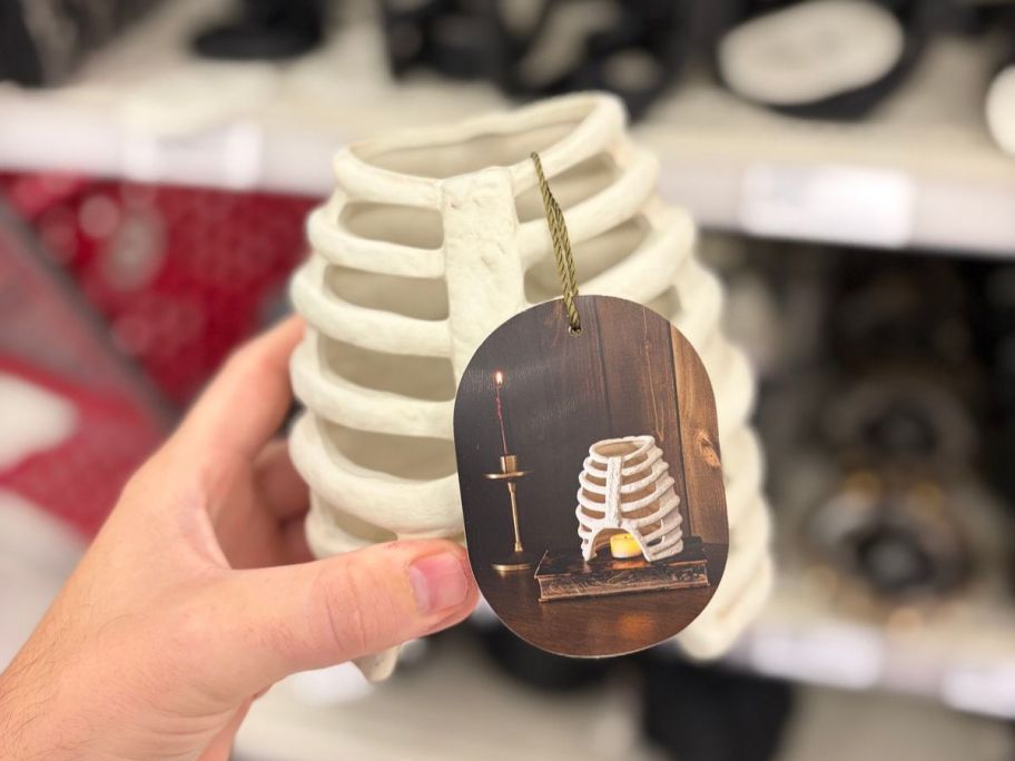 Threshold Halloween Rib Cage Candle Holder in hand in store