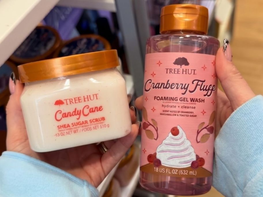 Hand holding Tree Hut Candy Candy Sugar Scrub and Cranberry Fluff Body Wash