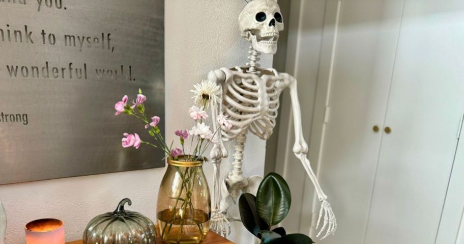 Way To Celebrate 5' Hanging Posable Skeleton Decoration in entryway