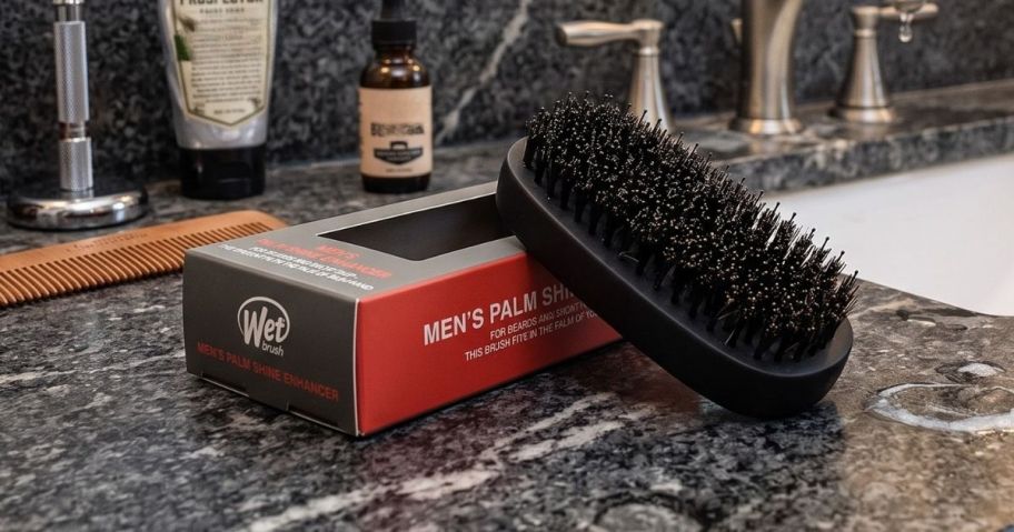 Wet Brush Men's Palm Shine Enhancer Hair Brush w/ IntelliFlex Bristles on bathroom counter