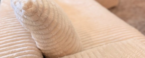 White corduroy sofa with ribbed fabric