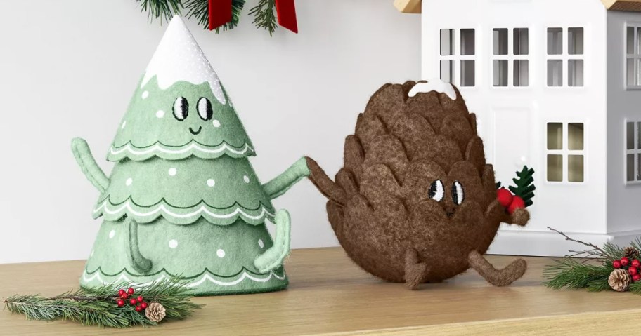 tree and pinecone felt figures holding hands