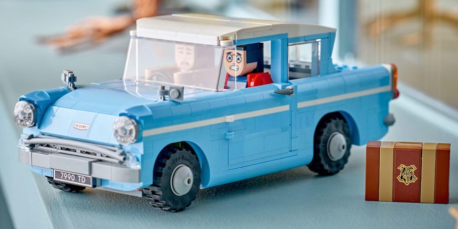 blue lego car with suitcase 