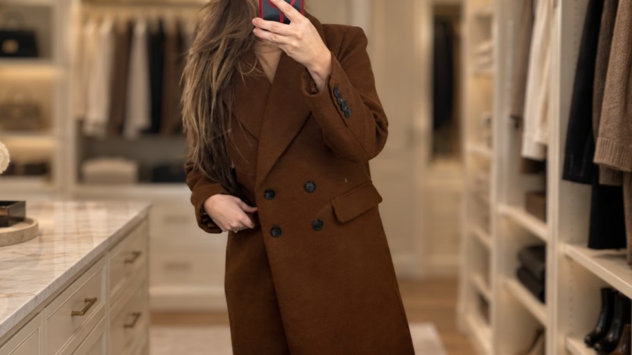 woman taking a selfie wearing an amazon essentials outerwear wool blend