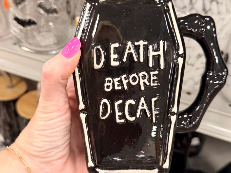 hand holding death by decaf mug 