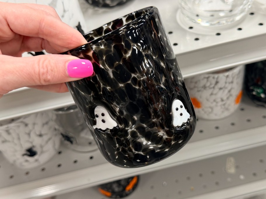 hand holding black ghost cup 