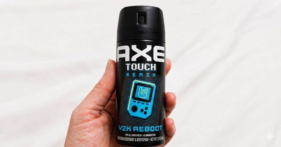 hand holding axe body spray