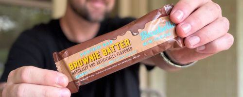 Stetson holding barebells protein bar