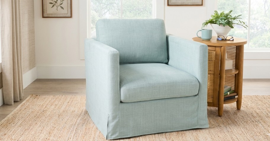 light green swivel chair in living room