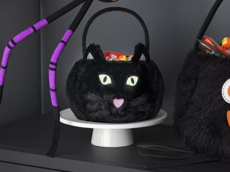 plush halloween treat pail shaped like a black cat