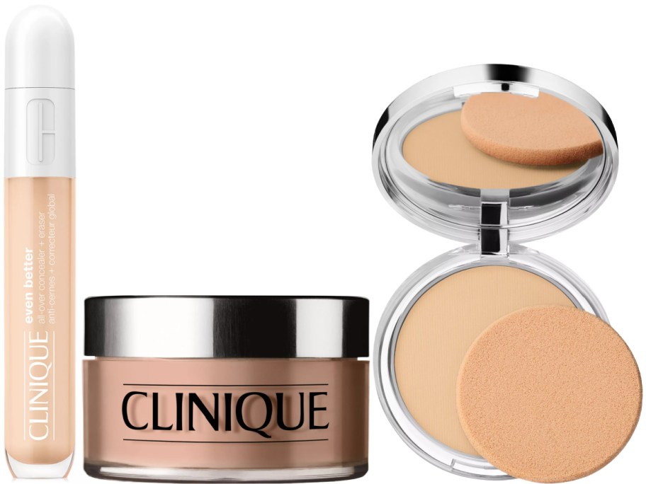 Clinique makeup products including a tube of concealer, a jar of powder, and an open compact with a pressed powder and sponge applicator.