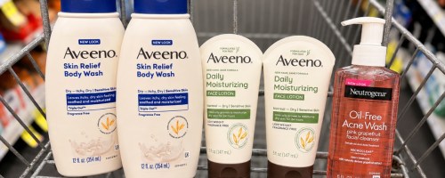 bottles of Aveeno body wash, face lotion, and Neutrogena Face Wash in a CVS cart