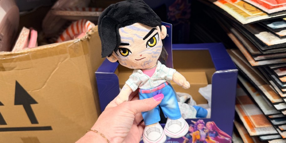 hand holding demon hunter plush 