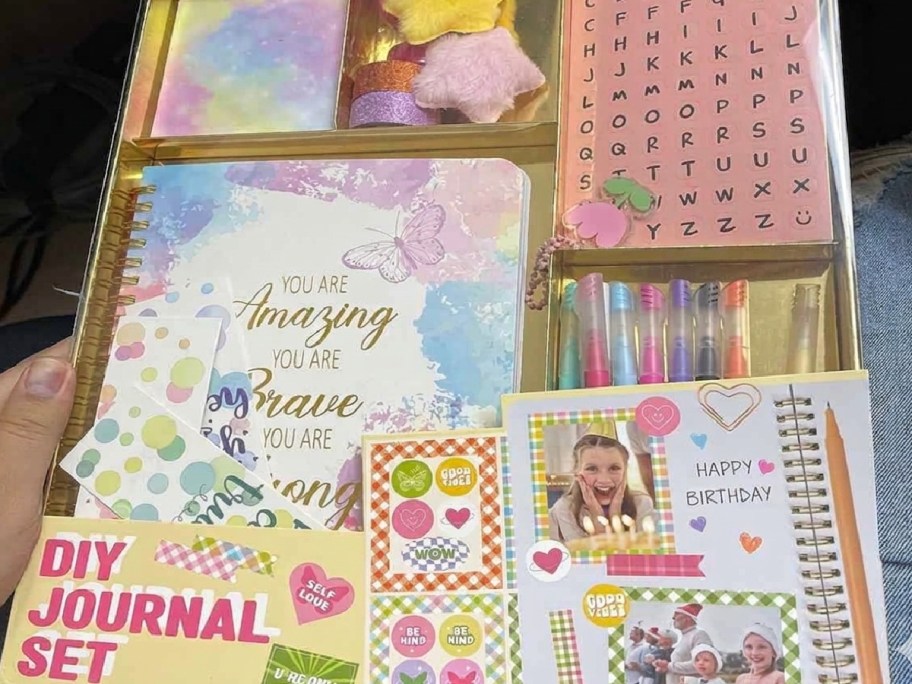 hand holding journal gift set