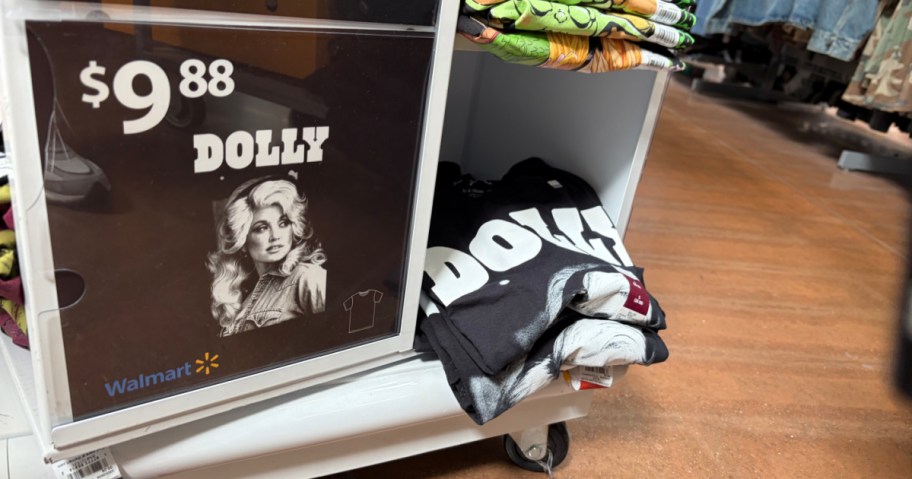 dolly parton tees at Walmart with a price sign