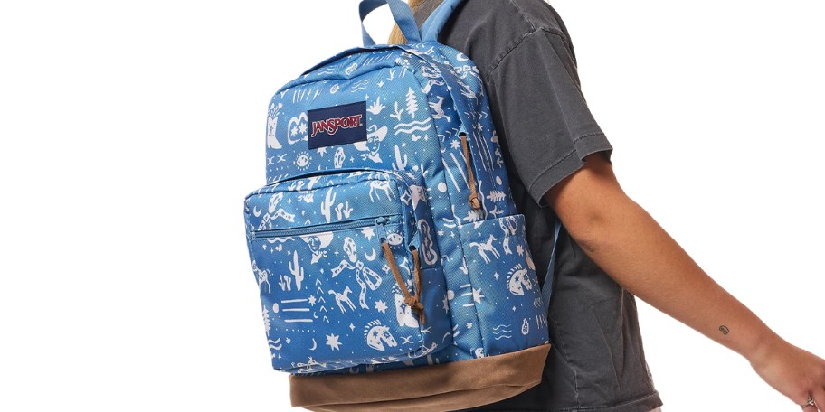 girl wearing blue backpack