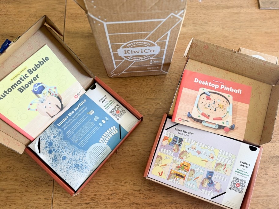 three kiwico crates on a tabletop
