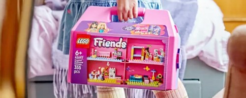 hand holding lego suitcase set
