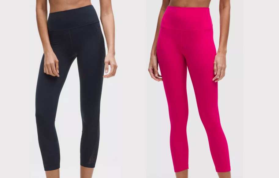 Two models wearing cropped high-rise leggings: a dark pair with subtle side patterns on the left and a solid bright pink pair on the right.
