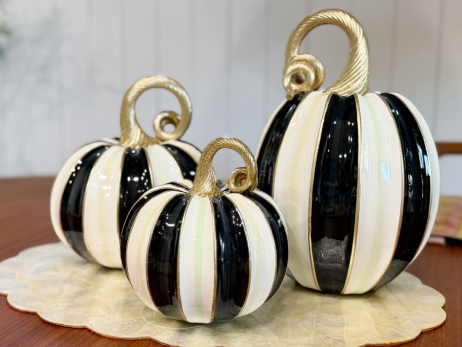 black and white striped pumpkins on table